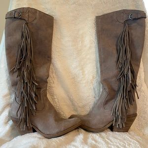 Adorable pair of knee high fringe boots for sale!